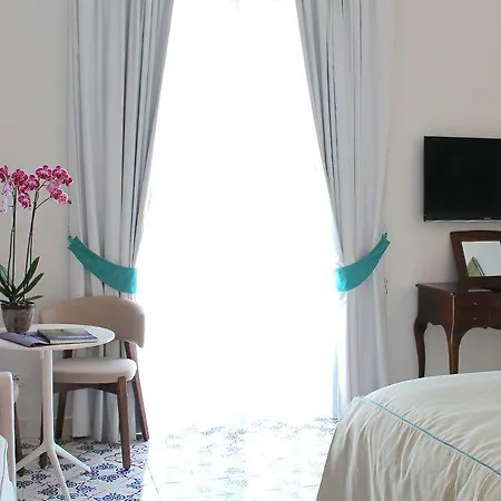 Guest house Diecisedici 4*