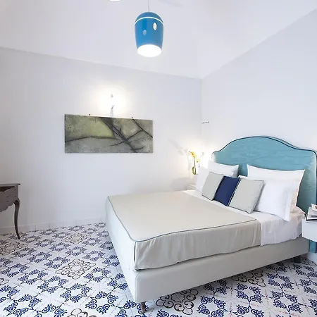 Diecisedici Vendégház