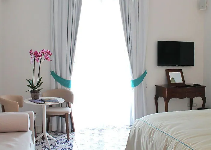 بيت ضيافة Diecisedici 4*