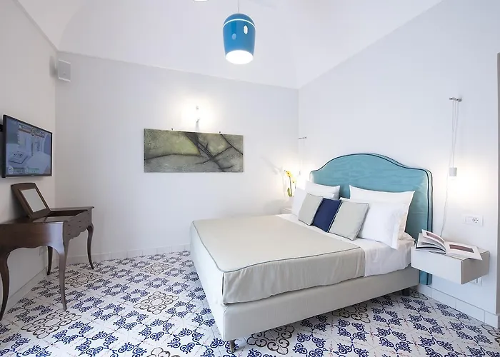 Diecisedici بيت ضيافة